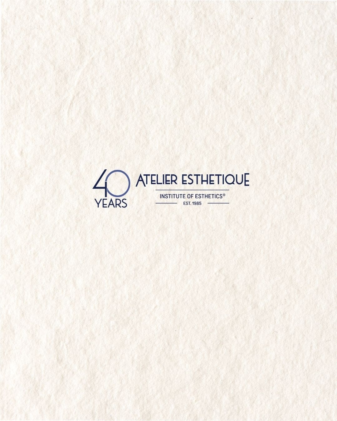 Atelier Esthetique Institute of Esthetics 40-year anniversary logo for upcoming events and educational programs.