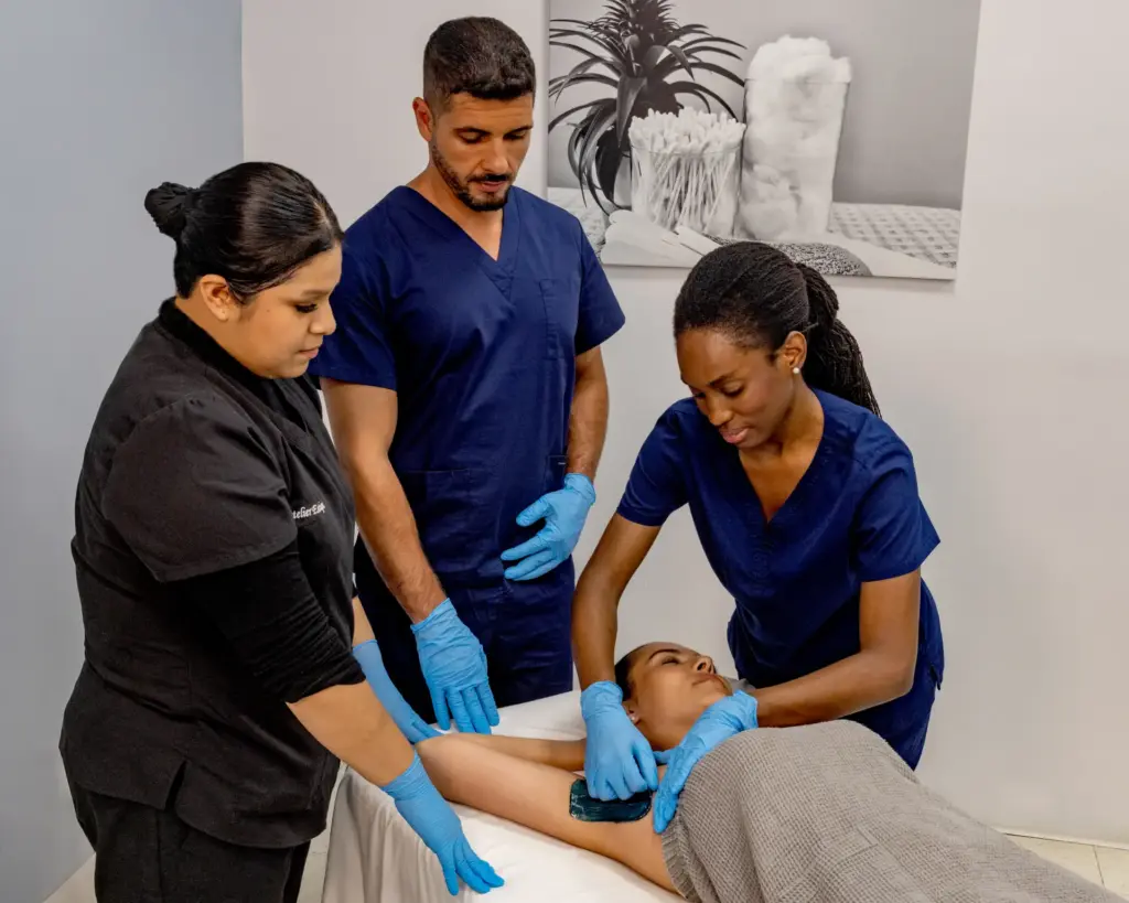 Atelier Esthétique student practicing waxing technique